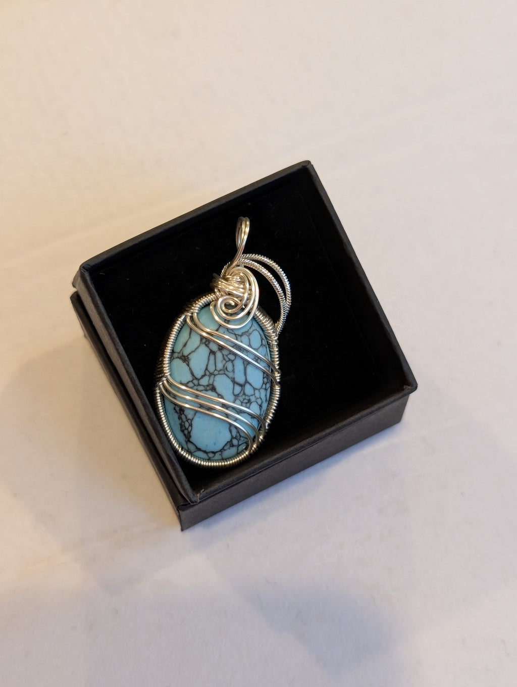 Turquoise Caster Pendant