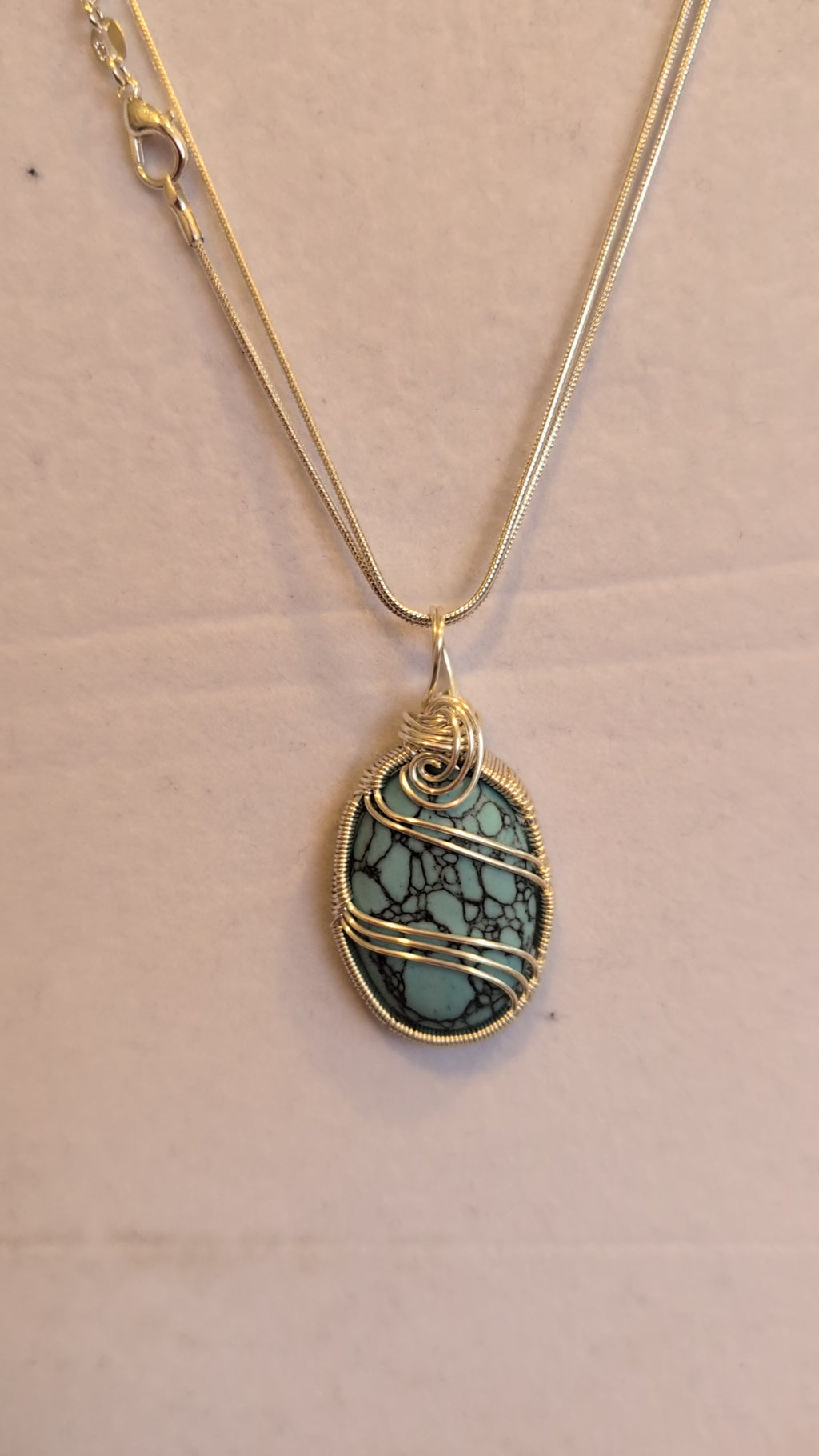 Turquoise Caster Pendant
