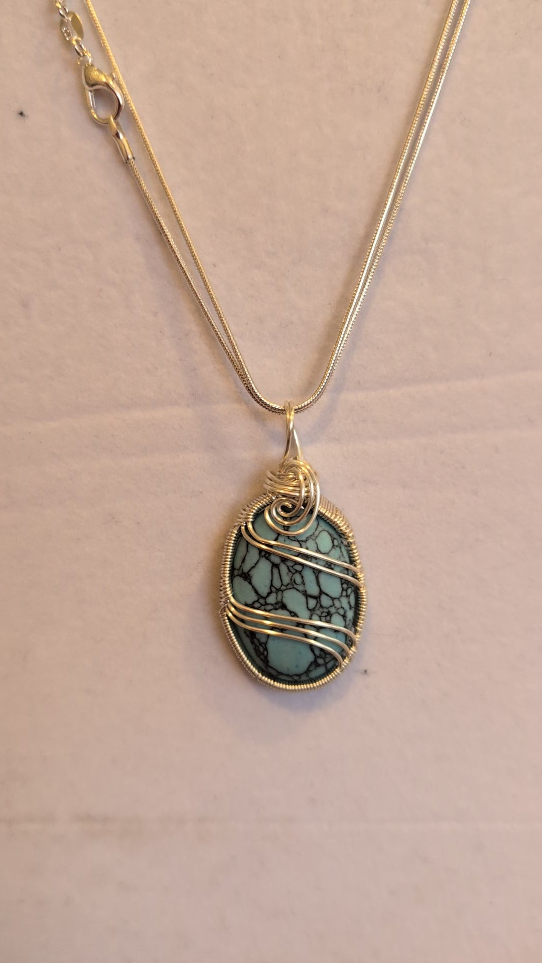 Turquoise Caster Pendant