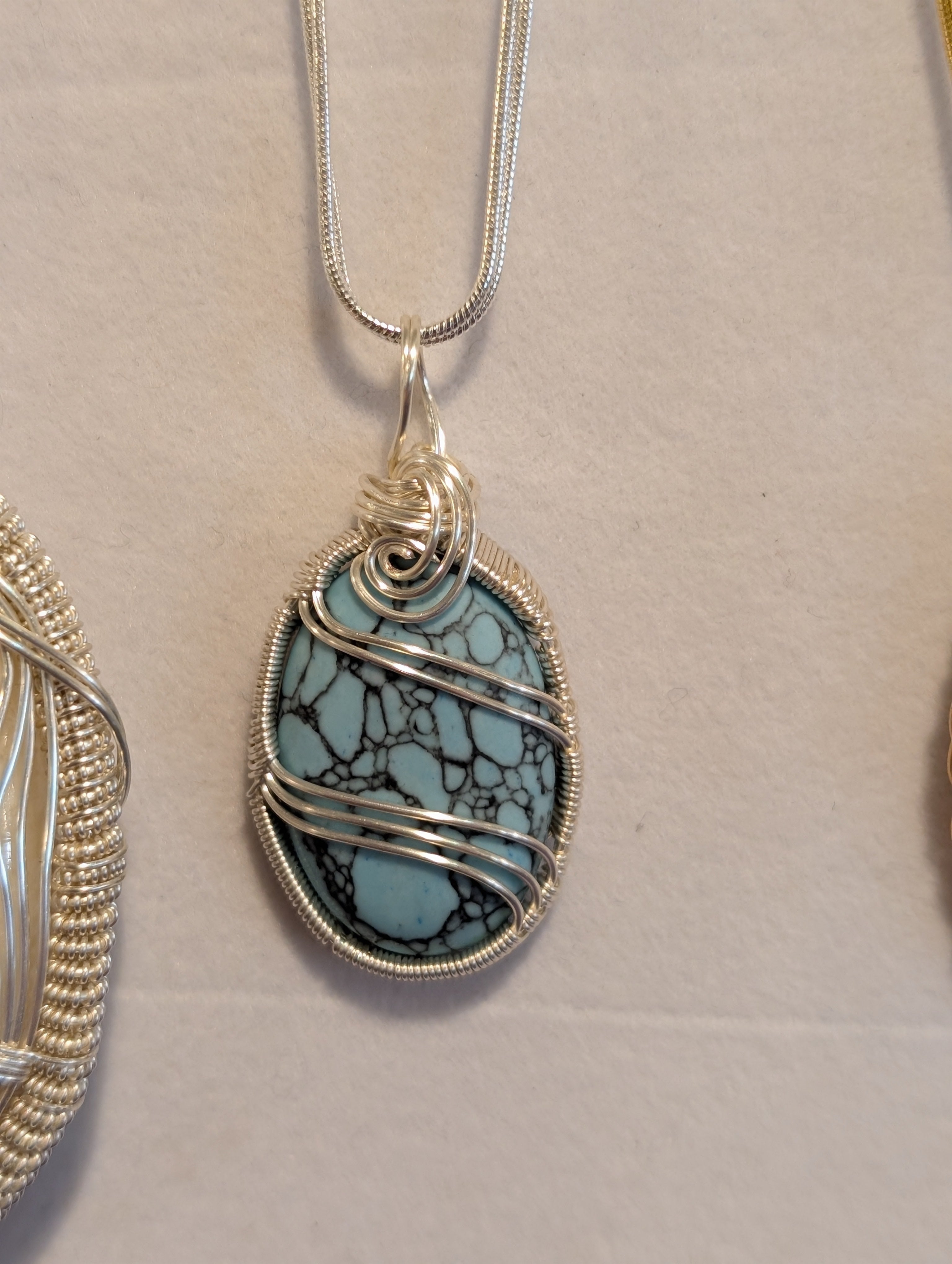 Turquoise Caster Pendant